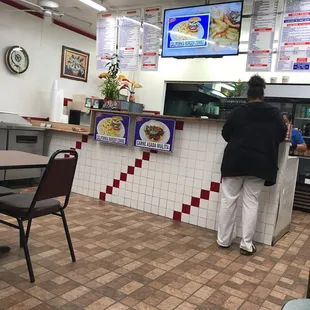 a man standing at the counter