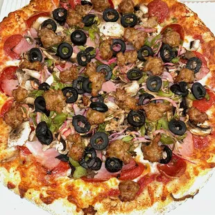 supreme pizza in medium large extra large