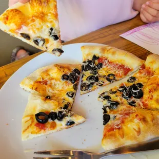 Kid's pizza, with olives added