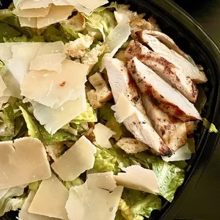 Classic Caesar. Added chicken for $5 extra. Loved the shaved parm! Croutons were a little soggy though. Grilled chicken is slightly dry.
