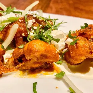 Spicy Buffalo Cauliflower  Score 92% Ask for a side of blue cheese dressing for dipping