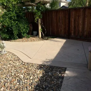 a patio with a pergolated area