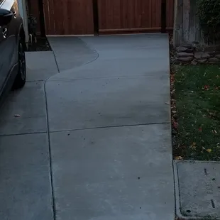 Added cement to widen driveway.