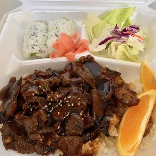 Beef teriyaki bento box with California roll