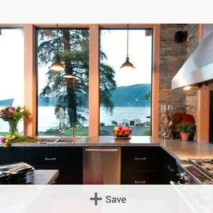 a kitchen with large windows