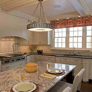 a kitchen with granite countertops
