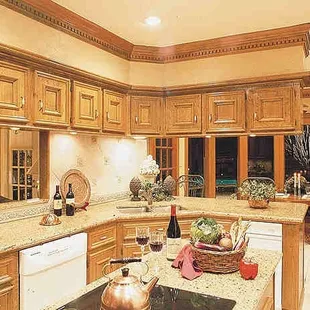 a kitchen with granite countertops