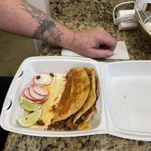 Crispy birria tacos with cheese on the outside