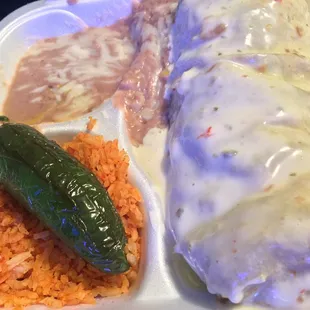 Asada burrito with smothered queso! And a chile toriado!!!