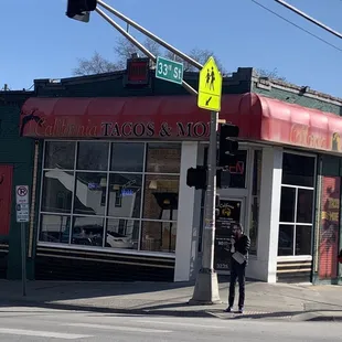 two people walking down the street