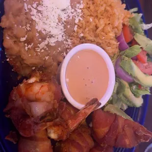 Shrimp wrapped in bacon and cheese with rice and beans and home made Corn Tortillas so delicious!!