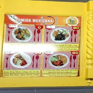 menus on a yellow wall