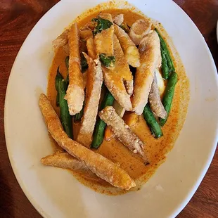 Fried Tilapia in red curry sauce. The sauce was good but I wish they used fresh fish instead of frozen from the box.