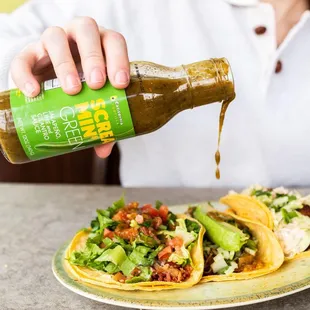 Screamin&apos; Green hot sauce on tacos