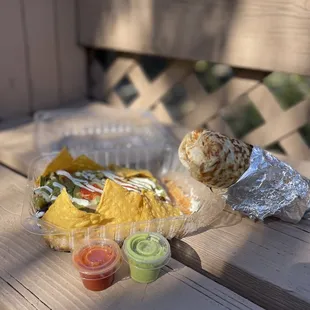 a plate of food on a picnic table