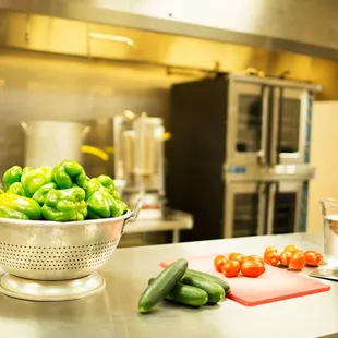a bowl of vegetables on a kitchen counter