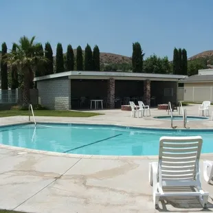 Shaded pool building where you can cook out and picnic, while your friends and family swim.