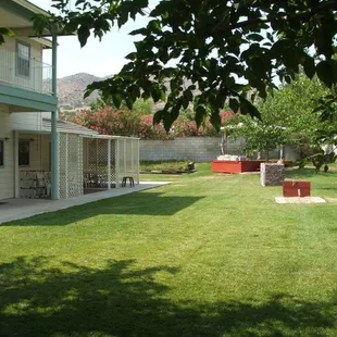 Clubhouse Backyard where you can enjoy the greenery and play all kinds of lawn games including horse shoes.