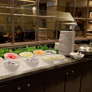 a buffet with a variety of food items
