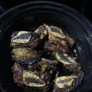 a plate of grilled bananas