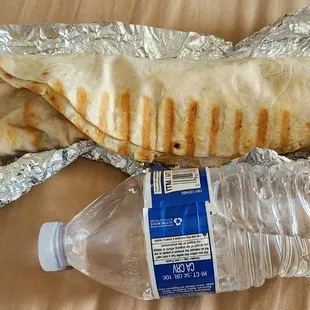 Chicken shawarma wrap (used a water bottle for reference). Comes with a soda can or water bottle. Gyro wrap looks like this as well.