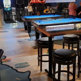 a pool table and bar