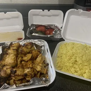 We ordered the 8 kabob family dinner comes with rice hummus tomato and chiles and of course chicken