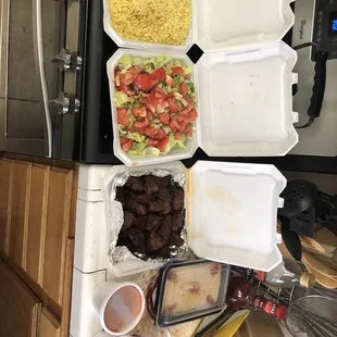 Family meal 8pc beef steak kabob ($34.99), also includes container of garlic sauce and hot sauce