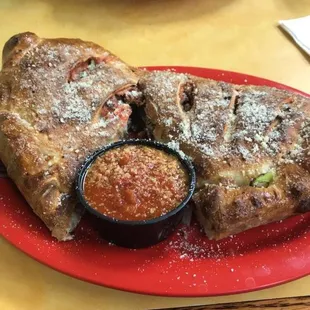 Calzone and pasta in the background