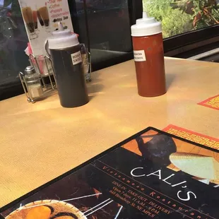a menu and a cup of coffee