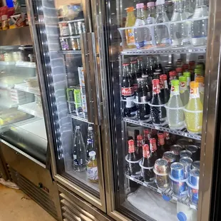 a refrigerated display of beverages