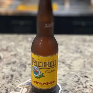 a bottle of beer on a counter