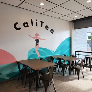 a restaurant with tables and chairs