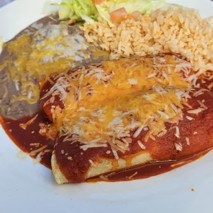 Enchilada plate - mine were chicken. Enchilada sauce had a little spice to it, which I love.