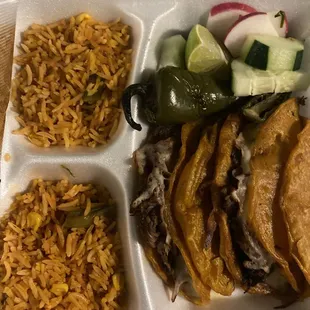 Quesabirria tacos with corn tortillas. It also comes with homemade consume!
