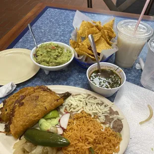 Quesabirria platter, chips and guacamole and horchata
