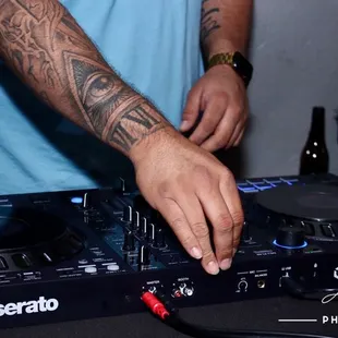 a dj mixing a track