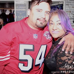 a man and a woman posing for a picture