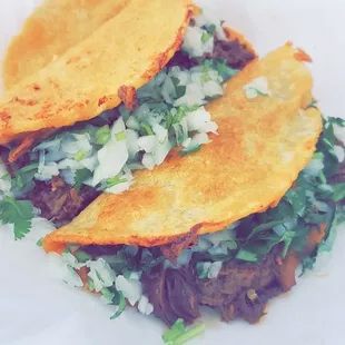 a close up of a taco