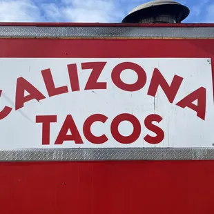 a sign for a taco truck