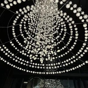 Chandelier with infinity mirror