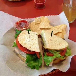 Turkey, guacamole, bacon, tomato, lettuce, cream cheese on fresh sourdough bread.   What isn&apos;t there to love?