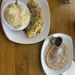 Farmer's omelette with sausage, peppers, mushrooms and swiss. Pancake on the side with grits