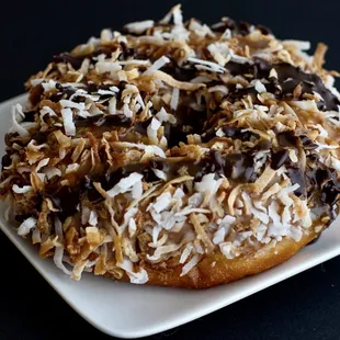 Yummy and I don't even care for coconut very much. Who needs Girl Scout cookies when you have this dognut version!! :)