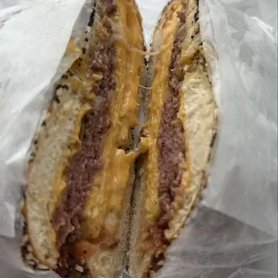 Pastrami and egg sandwich on an everything bagel.