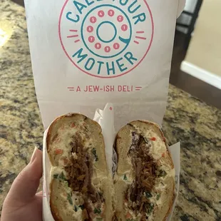 The Queen's Point with bacon, crispy shallots, Picked jalapeño and vegetable schmear on a cheddar bagel.