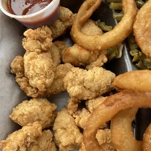 Large chicken nugget meal with onion rings and green beans