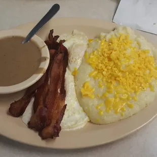 2 egg plate, grits with cheese, bacon, gravy