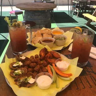 Lunch for two: Sampler Platter, Trio Chips, and two Bloody Marys.