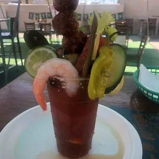 Weekend Bloody Mary: 3 meatballs, giant shrimp, bacon strip, salami wrapped cheese stick,  and tons of veggies. It's a meal!